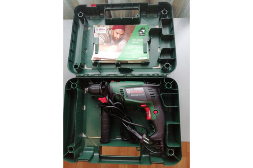 Дриль ударний Bosch UniversalImpact 700 з набором свердл та біт X-line 15 шт (060313100F) фото 3